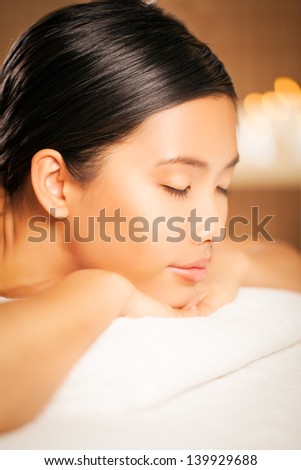 Asian woman waiting for a massage at a massage parlor.