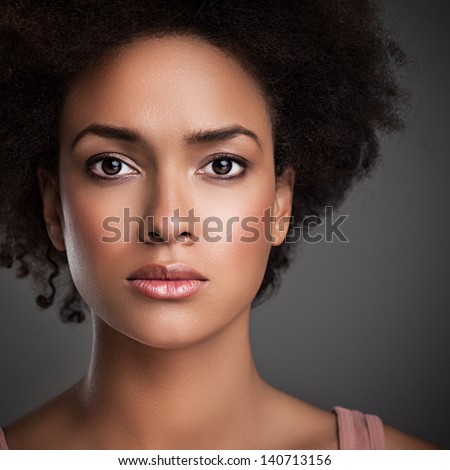 Portrait Of An African Woman With A Serious Expression On Her Face.