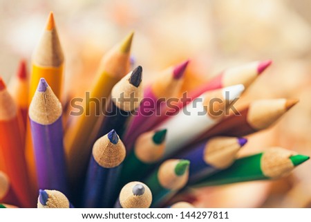 Wooden colour pencils in close-up.