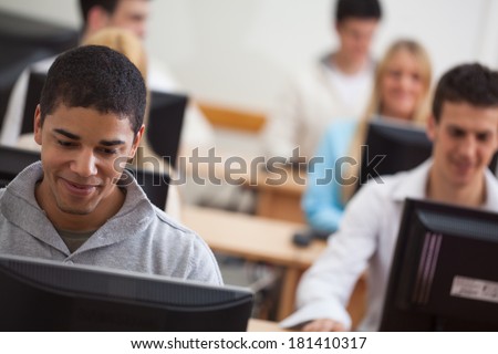 Multiethnic group of students in the computer lab.