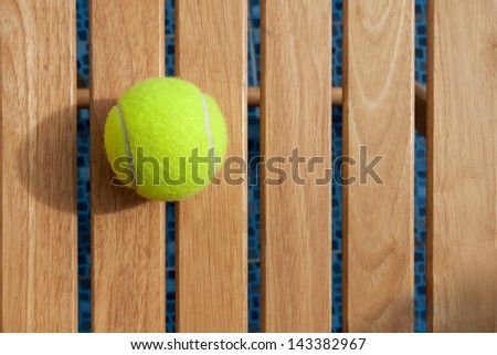 tennis on the wood chair
