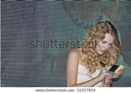 NASHVILLE, TN - JUNE 14: Country singer Taylor Swift signs autographs in the Nashville Convention Center during the CMA Festival June 14, 2009 in Nashville, Tennessee.