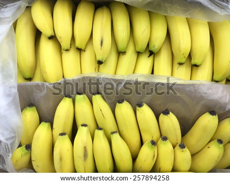 Bunch of ripe bananas in open packing