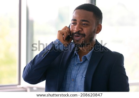 black business man on phone