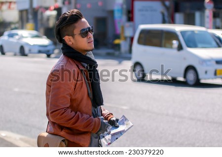 Thai black-skin man with sun glasses traveling in japan 05