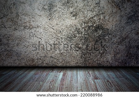 Grunge room interior with wooden floor and cement wall background