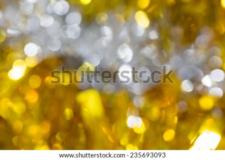 Bokeh abstract background of white and gold christmas fur decoration