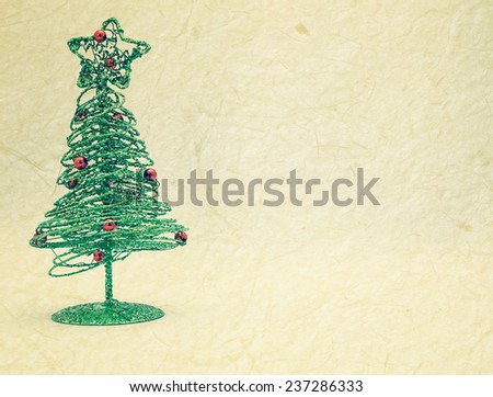 Christmas Tree decorations on mulberry paper texture for background