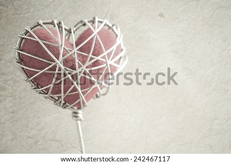 heart in wire cage