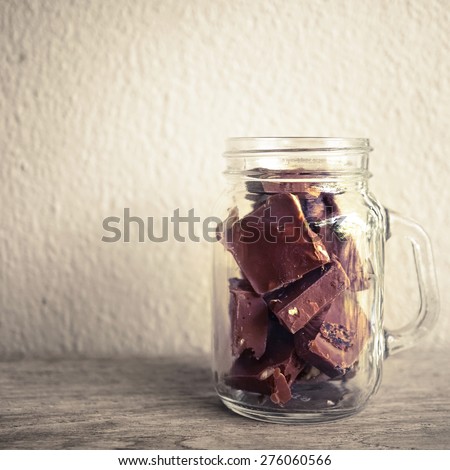 chocolate pieces in the glass bottle