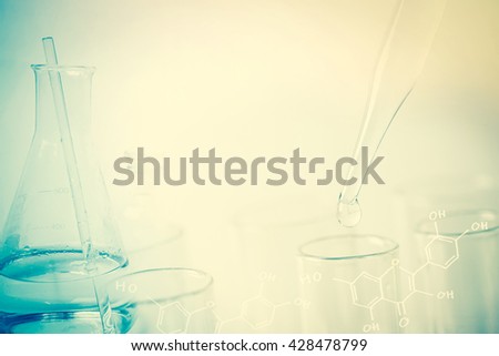 water drop and laboratory for natural chemistry concept