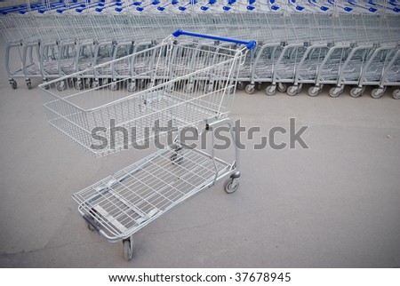 Big group of shopping carts in a row
