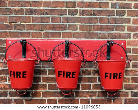 Old fire buckets at a train station