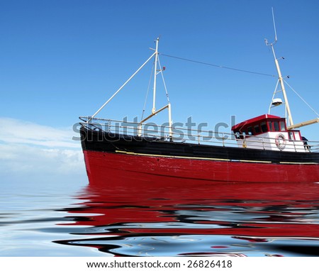 Bright red fishing boat at sea in calm water.