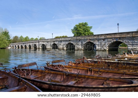 A group of traditional rowing boats on the river Avon in Stratford-upon-Avon, the birthplace of William Shakespeare