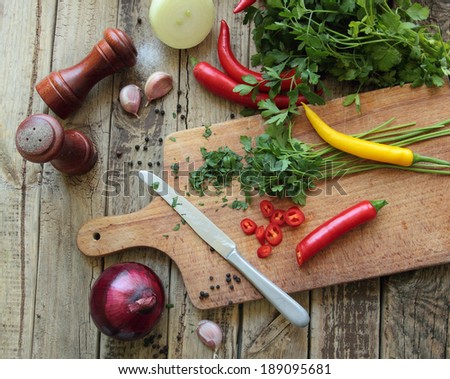 Vegetables and herbs on the kitchen desk