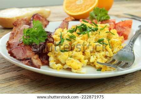 Breakfast with scrambled eggs and bacon