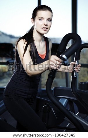 Beautiful lady working out in fitness