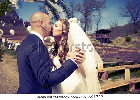 Wedding kiss in cross process colors