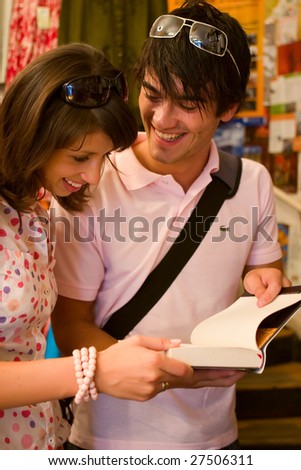 Young couple - shopping books