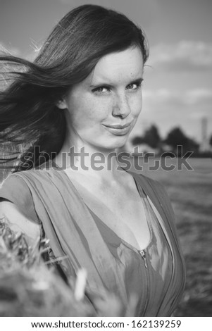 Monochrome girl - hair in wind