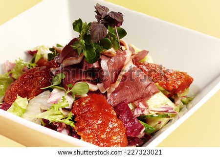 Delicious fresh salad of smoked duck breast, lettuce and chutney