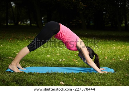Yoga loving lady exercising outdoor
