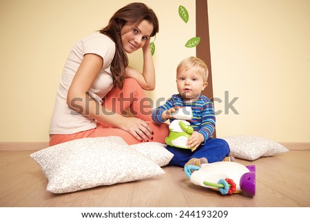 Woman and her son at home
