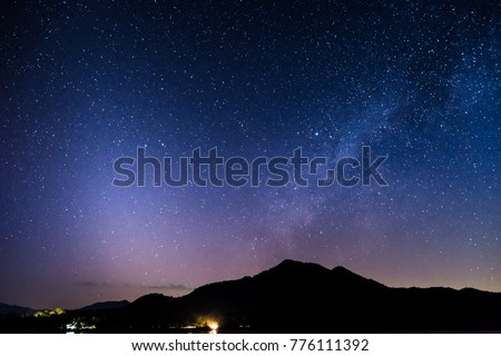Rivers, mountain stars, zodiacal light and the Milky Way on a beautiful blue night in New Day.