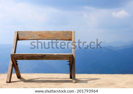 wood chair with mountain view