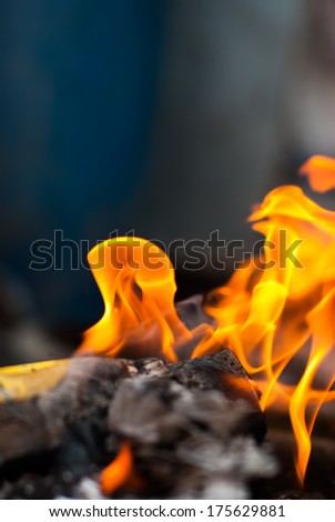 Burning paper for Hungry Ghost Chinese Festival in Thailand