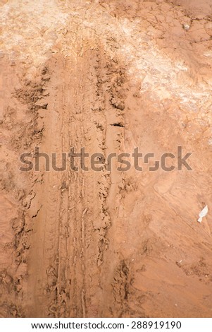 Wheel tracks on the soil.close up