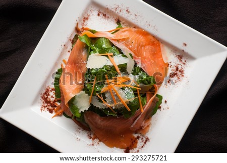 Appetizer Smoked salmon salad with rocket