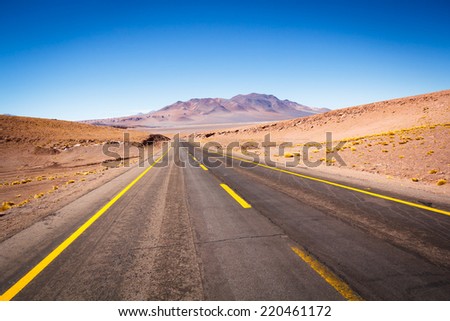 Express Route 27 in the Atacama desert, Chile. The Atacama Desert is a plateau in South America, covering a 1,000-kilometre (600 mi) strip of land on the Pacific coast, west of the Andes mountains.