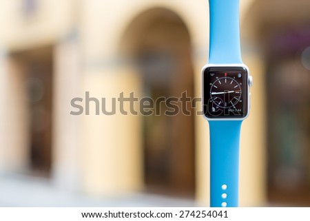 BOLOGNA, ITALY - APR 30, 2015: the Apple Watch. The first wrist device produced by Apple. Screen displays the clock application.