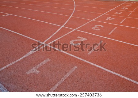 Athletic running track with number one,two,three, four,five and six in stadium