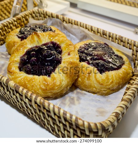 Close up of Blueberry Pies in basket at bakery shop