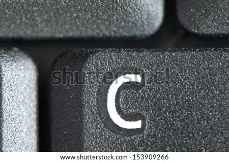 Macro photo of a laptop computer\'s keyboard: letter C.