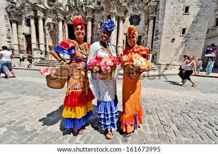 Havana, Cuba, May 6, 2009. Three Cuban Women In Traditional Dresses In Havana, Cuba, On May 6th, 2009.