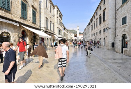 DUBROVNIK, CROATIA, MAY 22, 2011.  People walking on the main street of the old town of Dubrovnik. in Dubrovnik, Croatia, on May 22nd, 2011.