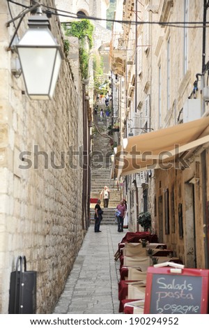 DUBROVNIK, CROATIA, MAY 22, 2011.  People walking on the narrow streets in the town of Dubrovnik. in Dubrovnik, Croatia, on May 22nd, 2011.