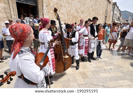DUBROVNIK, CROATIA, MAY 22, 2011. A Croatian folk music group in traditional clothes in the main street of the old town of Dubrovnik. in Dubrovnik, Croatia, on May 22nd, 2011.