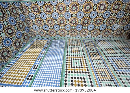 SAADIAN TOMBS PALACE, MARRAKECH, MOROCCO, MAY 11, 2014. Tombs decorated with colourful mosaic in a hall inside of the buildigns of the Saadian Tombs Palace,  Marrakech, Morocco, on May 11th, 2014.