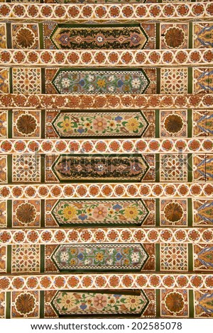 BAHIA PALACE, MARRAKECH, MOROCCO, MAY 11, 2014. Decorated ceiling in one of the halls in Bahia Palace, in Marrakech, Morocco, on May 11th, 2014.