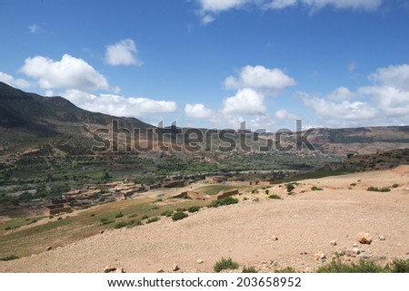 MOROCCO, MAY 13, 2014. Small buildings in a valley in the Atlas mountains of Morocco, on May 13th, 2014.