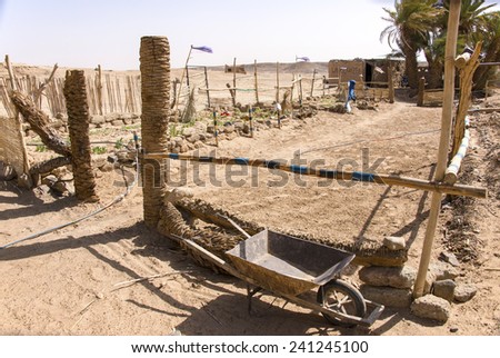 SAHARA DESERT, MOROCCO, MARCH 6, 2014.  An arcane vegetable garden built around an oasis in the Sahara Desert in Morocco, on March 6th, 2014.
