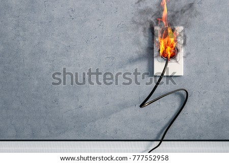 fire and smoke on electric wire plug in indoor, electric short circuit causing fire on plug socket