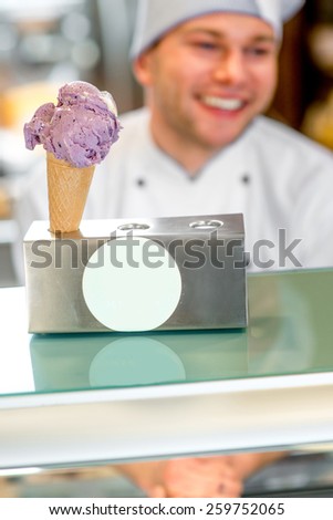 Ice cream in the waffle on stand in the pastry shop