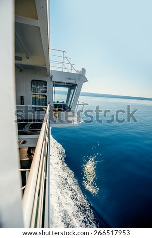 Ferry cabin on the sea and mountains on background