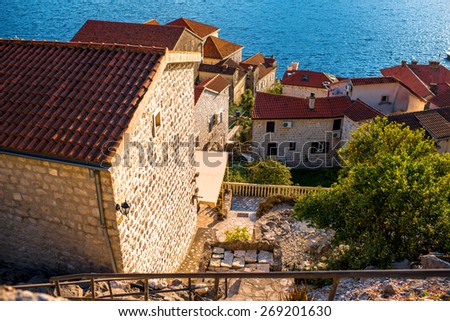 Living buildings with gardens in Perast city, Montenegro